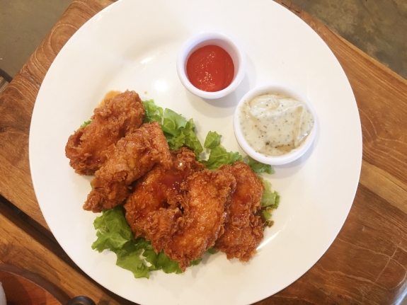 * Chipotle Chicken Tenders 70 Fried chicken tenders (Kentucky style) smothered with our house honey-chipotle sauce and served with a side of ranch